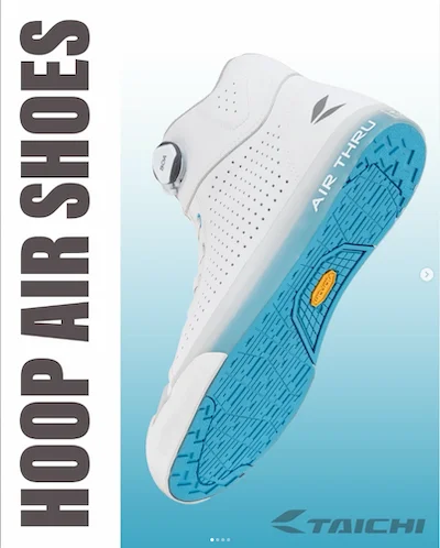 Close-up of a white athletic shoe with blue sole, labeled 'Air Thru,' with the text 'Hop Air Shoes' on the left side.