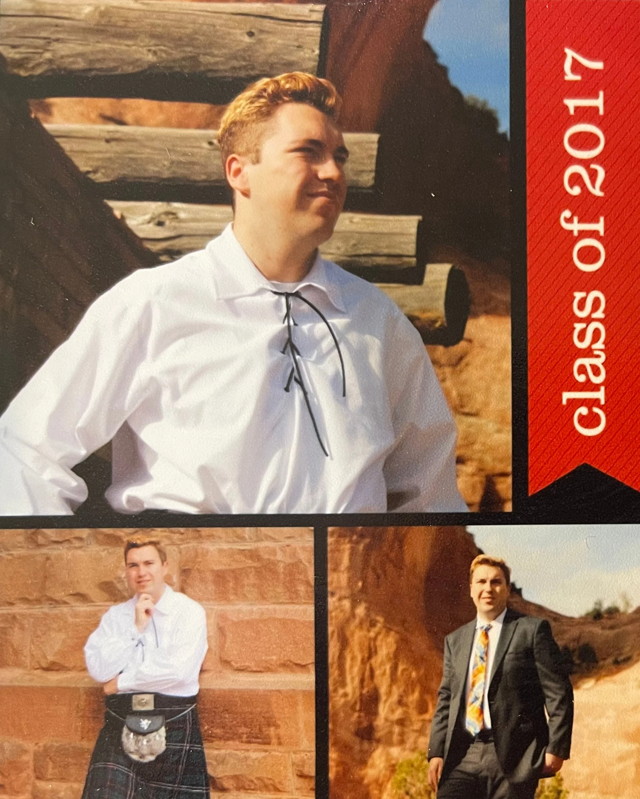 Photograph of a young man dressed in formal clothing, standing outdoors in front of a stone and wooden background with a red banner on the right side.