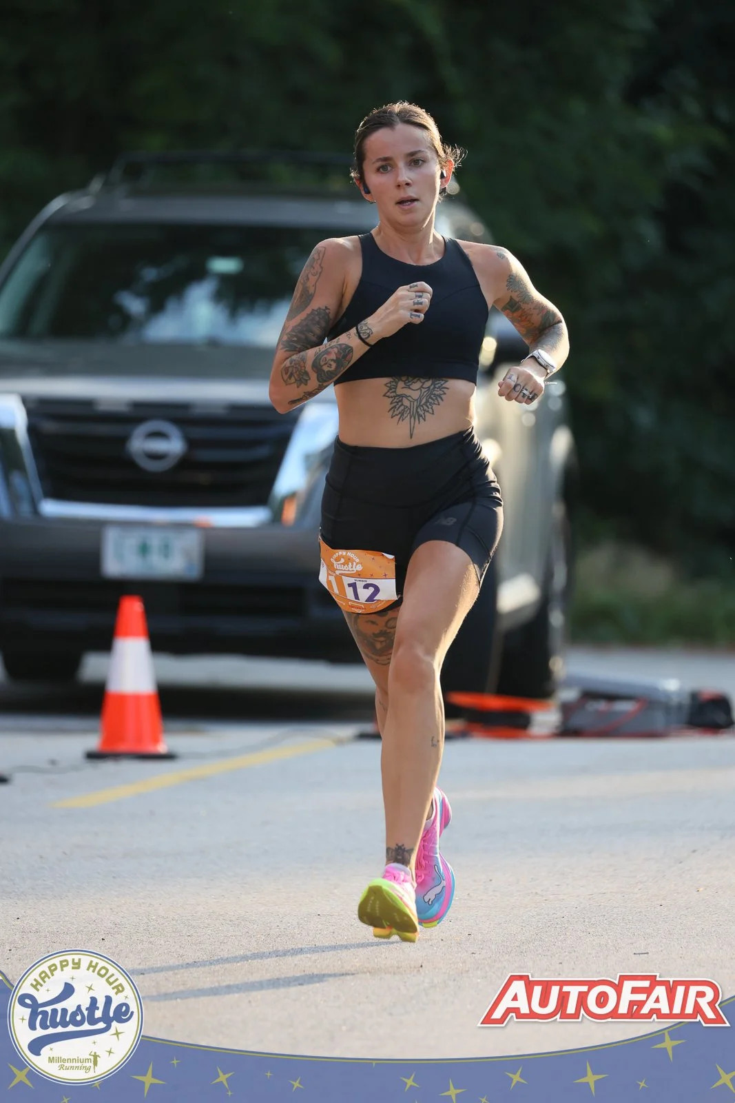 Hannah running in a road race while training with TRI2RUN Coaching.