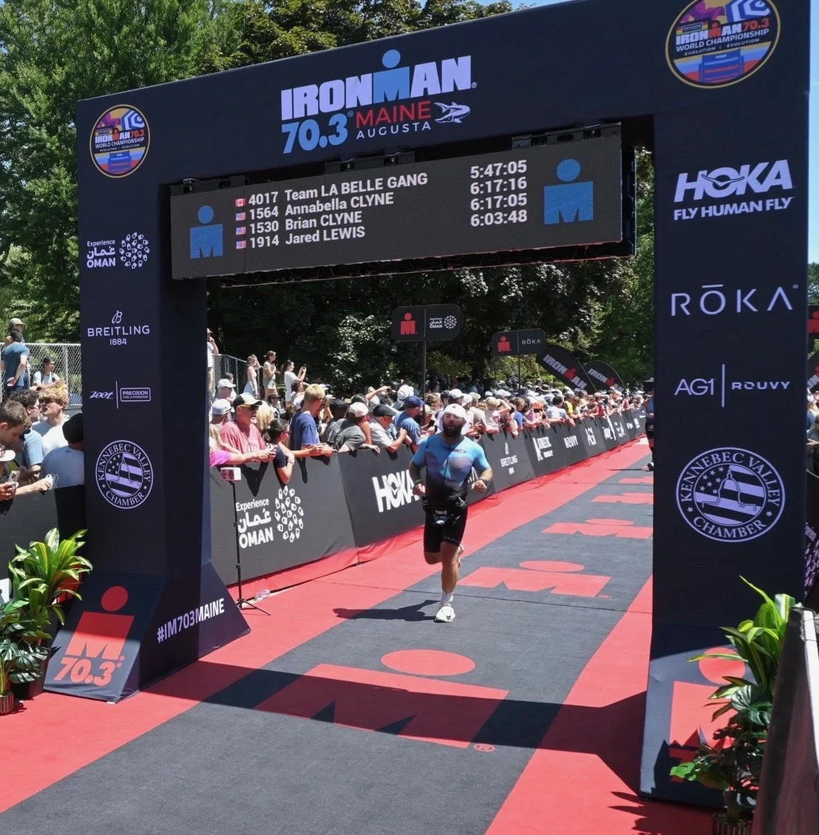 TRI2RUN athlete finishing IRONMAN 70.3 Maine