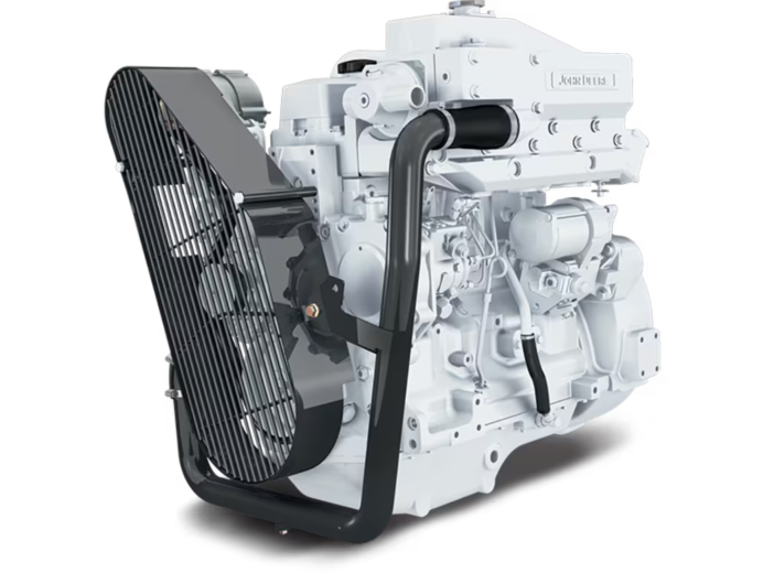 White industrial engine with black protective fan guard and exhaust pipe.