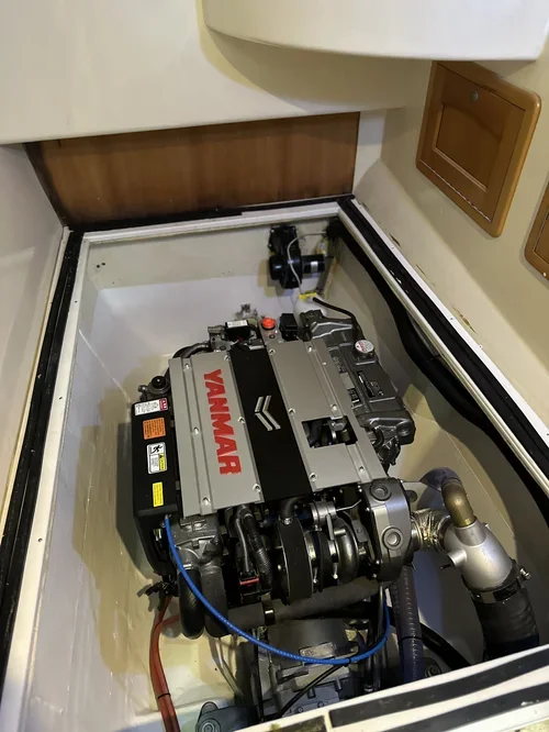 Engine installed in a boat’s engine compartment with the Yamaha logo visible.