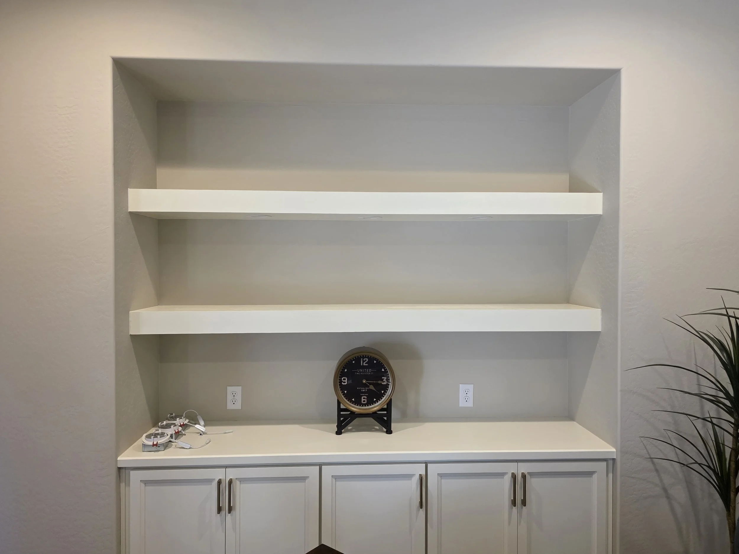 Built-in shelving:
Custom built-in shelving and custom cabinets and countertop