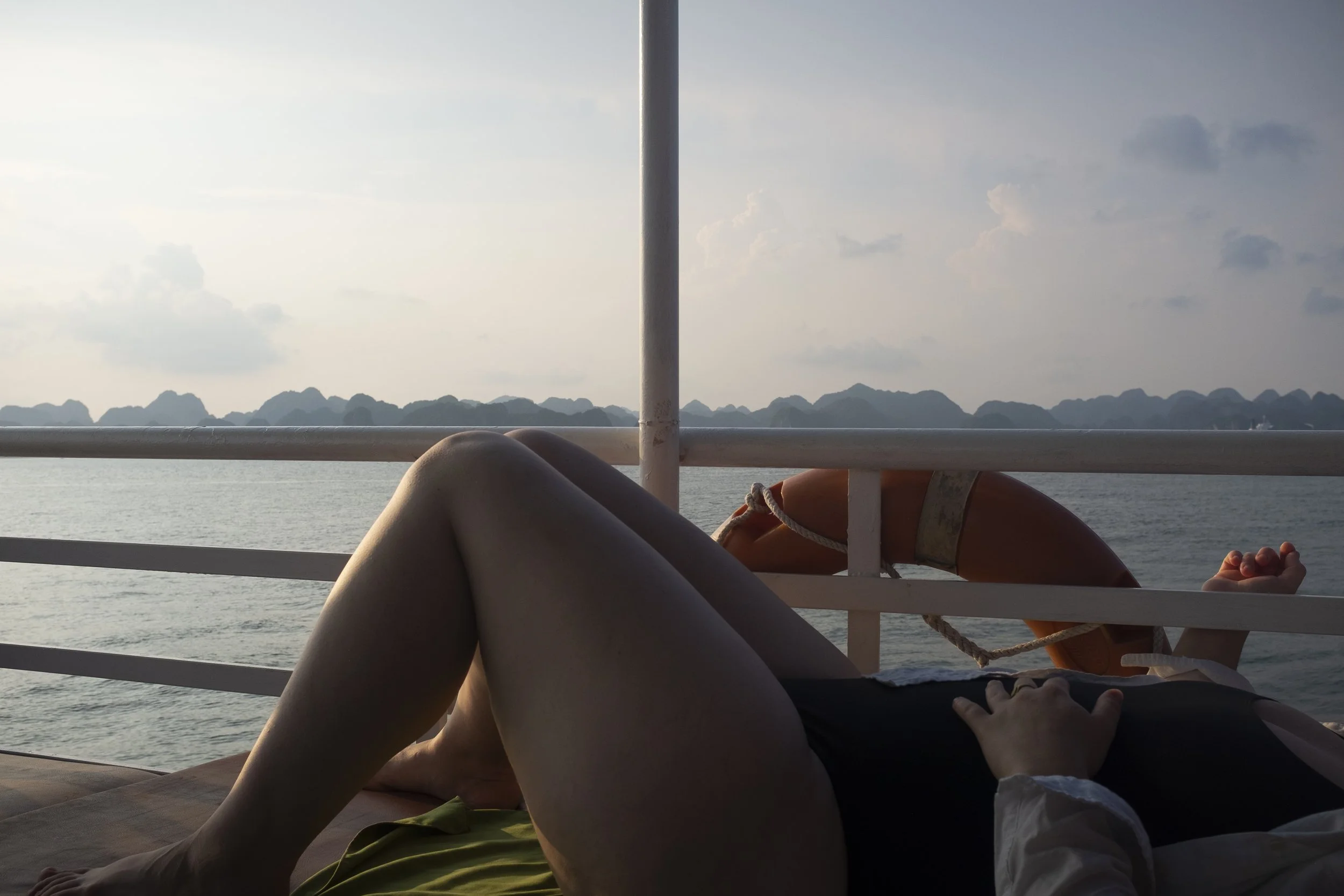37_Caitylayingonboat.jpg