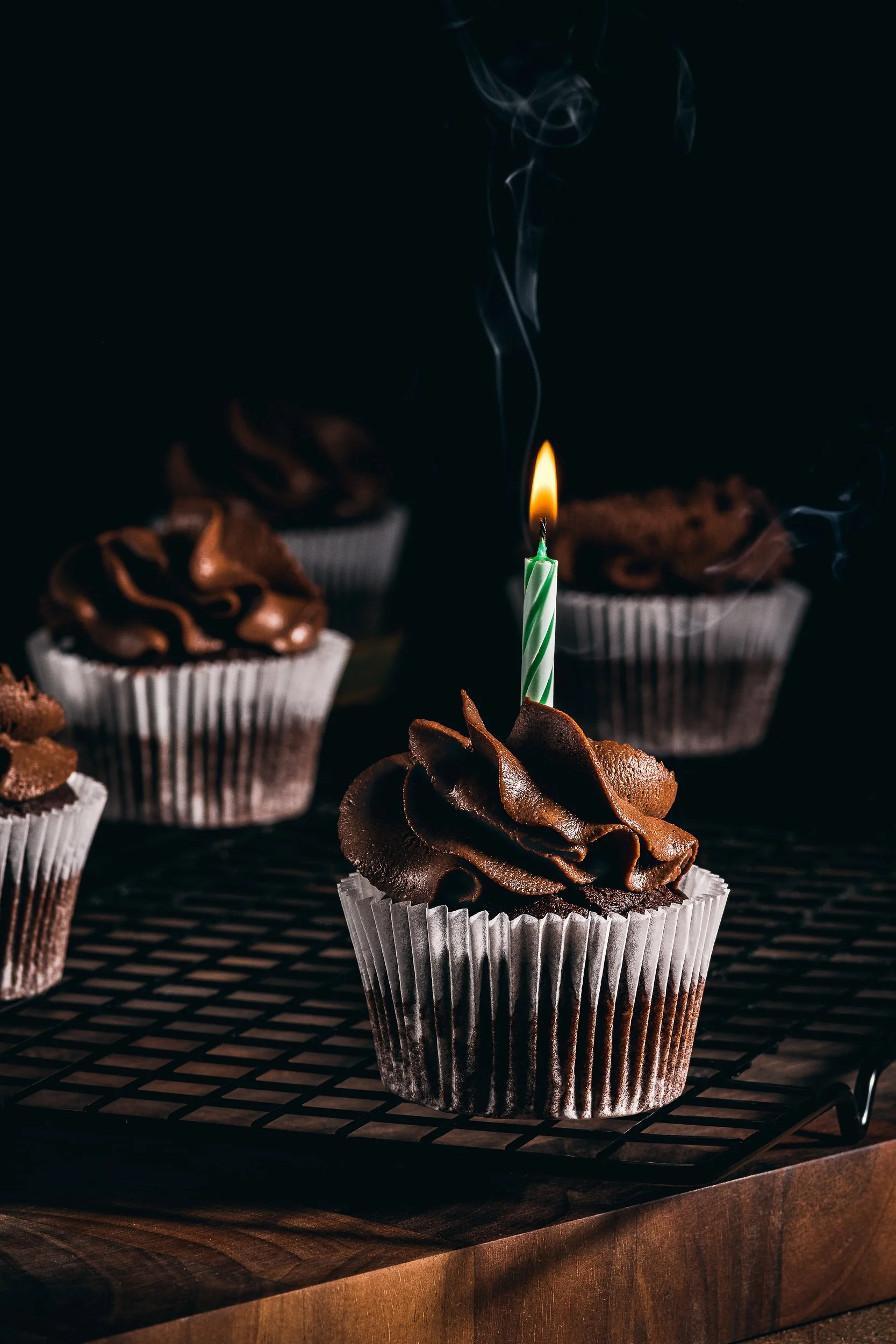 Professional food styling and photography of chocolate cupcakes with rich frosting, created for bakery, dessert and commercial advertising content