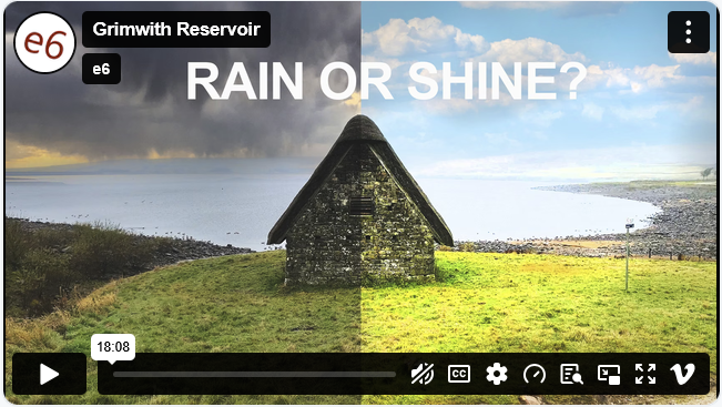 A split landscape showing a weathered stone structure near Grimwith Reservoir; one side depicts stormy weather, and the other sunny with a blue sky.