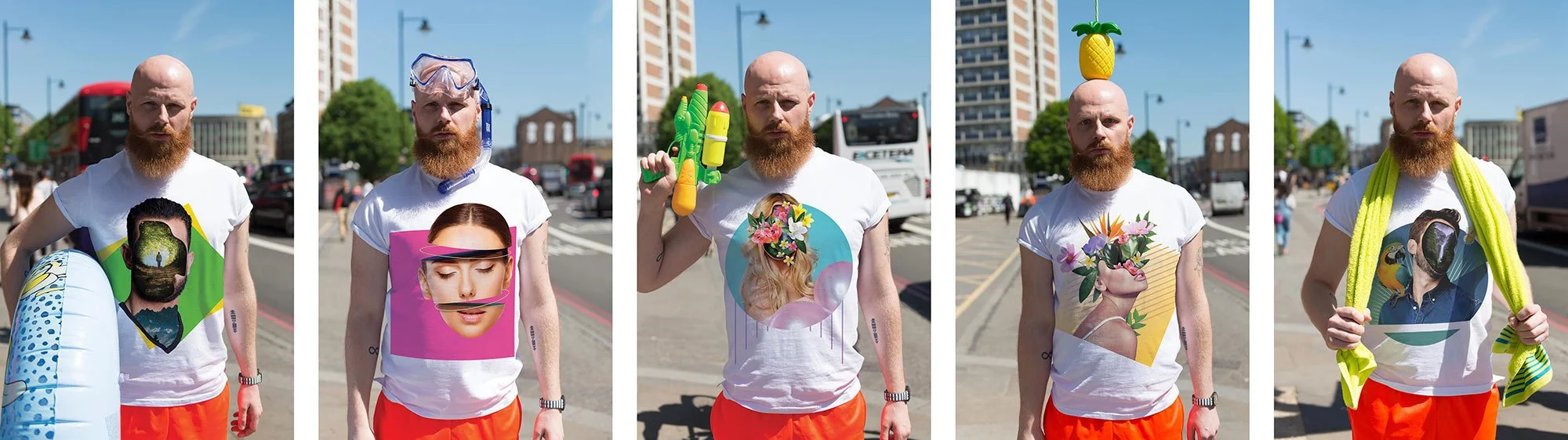 Five men standing outdoors on a sunny day, each wearing a white t-shirt with different colorful graphic designs and red shorts. They are holding inflatable pool toys, water guns, or wearing accessories like a snorkel mask and a towel. The background shows a city street with parked cars, buildings, and pedestrians.