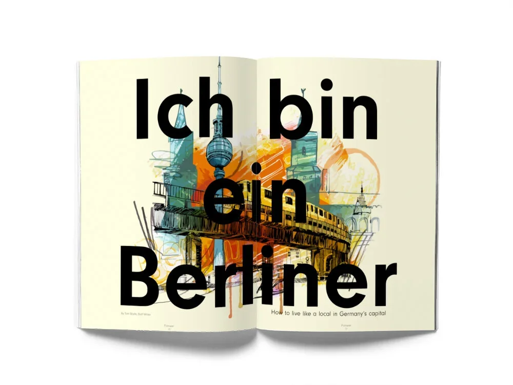 Open magazine spread featuring colorful artistic illustrations of Berlin landmarks, with overlaid large black text reading 'Ich bin ein Berliner'.
