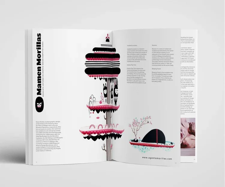 A printed magazine or brochure with an illustration of a multi-tiered cake with black, pink, and white colors, and whimsical elements like faces and trees, titled 'Marmem Morillas'.