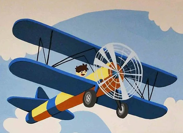 A cartoon illustration of a boy flying a vintage biplane airplane with a propeller and colorful design, flying among clouds.