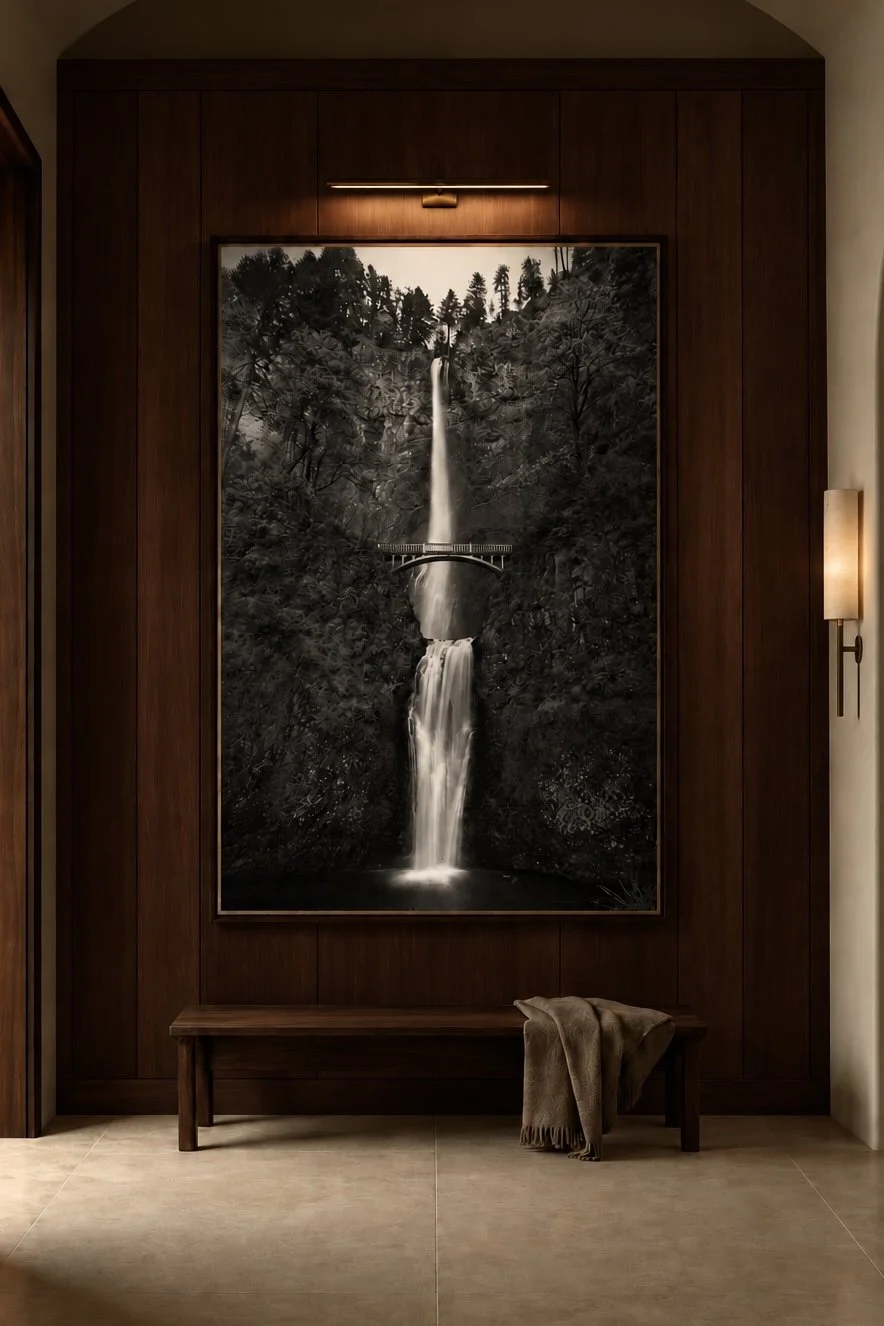 - [ ] multnomah falls, a black and white photograph of a tall waterfall falling over the bridge. Displayed in a hotel lobby. Fine art photography prints by Terron Studio.
