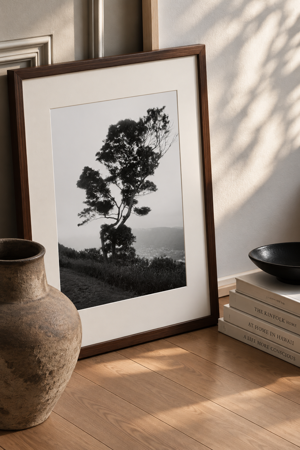 - [ ] Tantalus, a black and white photograph of a solitary hillside tree, framed next to a vase and books. Fine art photography prints by Terron Studio.