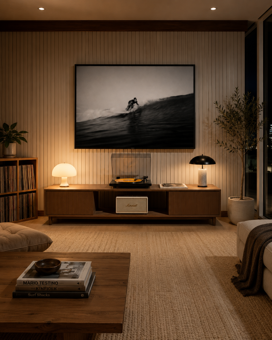 Way of Life, a horizontal black and white photograph of a surfer riding a wave, displayed above a stereo console. Fine art photography prints by Terron Studio.