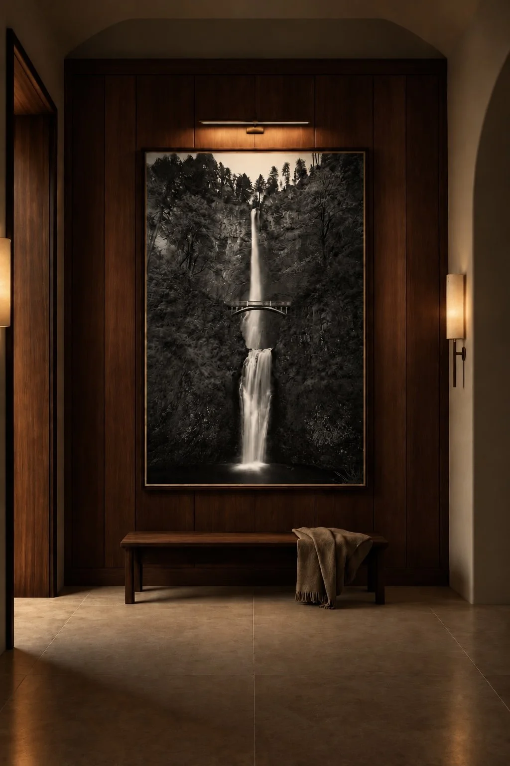- [ ] multnomah falls, a black and white photograph of a tall waterfall falling over the bridge. Displayed in a hotel lobby. Fine art photography prints by Terron Studio.