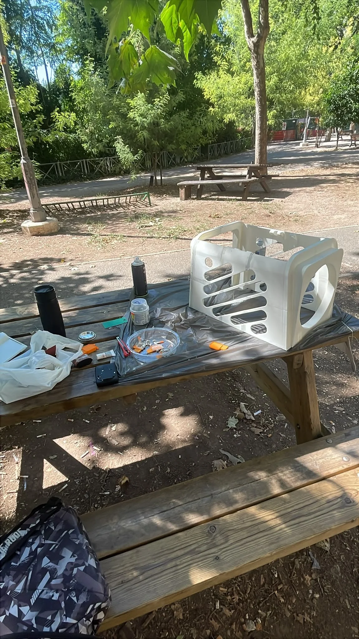 Outdoor park working area. Industrial design prototyping. high fidelity prototyping. sanding, polishing and 3d printing.