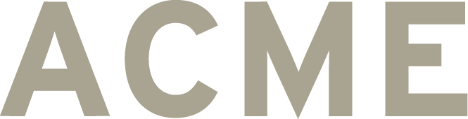 Close-up of the word 'ACME' in bold, gray letters on a black background.