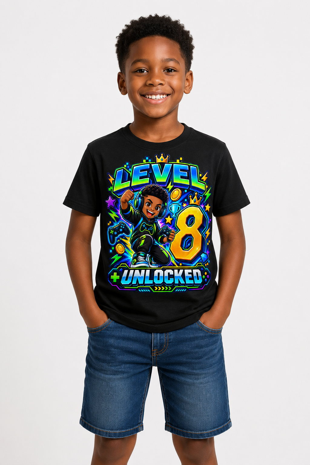 Smiling young boy wearing a black graphic t-shirt with colorful gaming-themed design and the words 'Level 8 Unlocked'