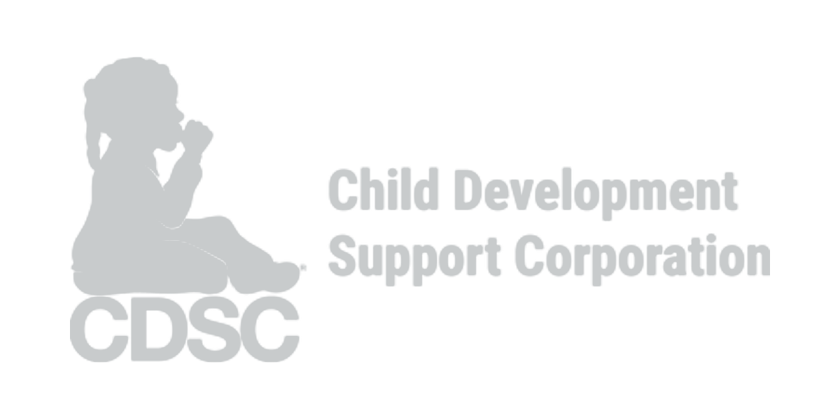 Silhouette of child sitting with head bowed and hand raised to face, next to the words Child Development Support Corporation and the acronym CDSC.