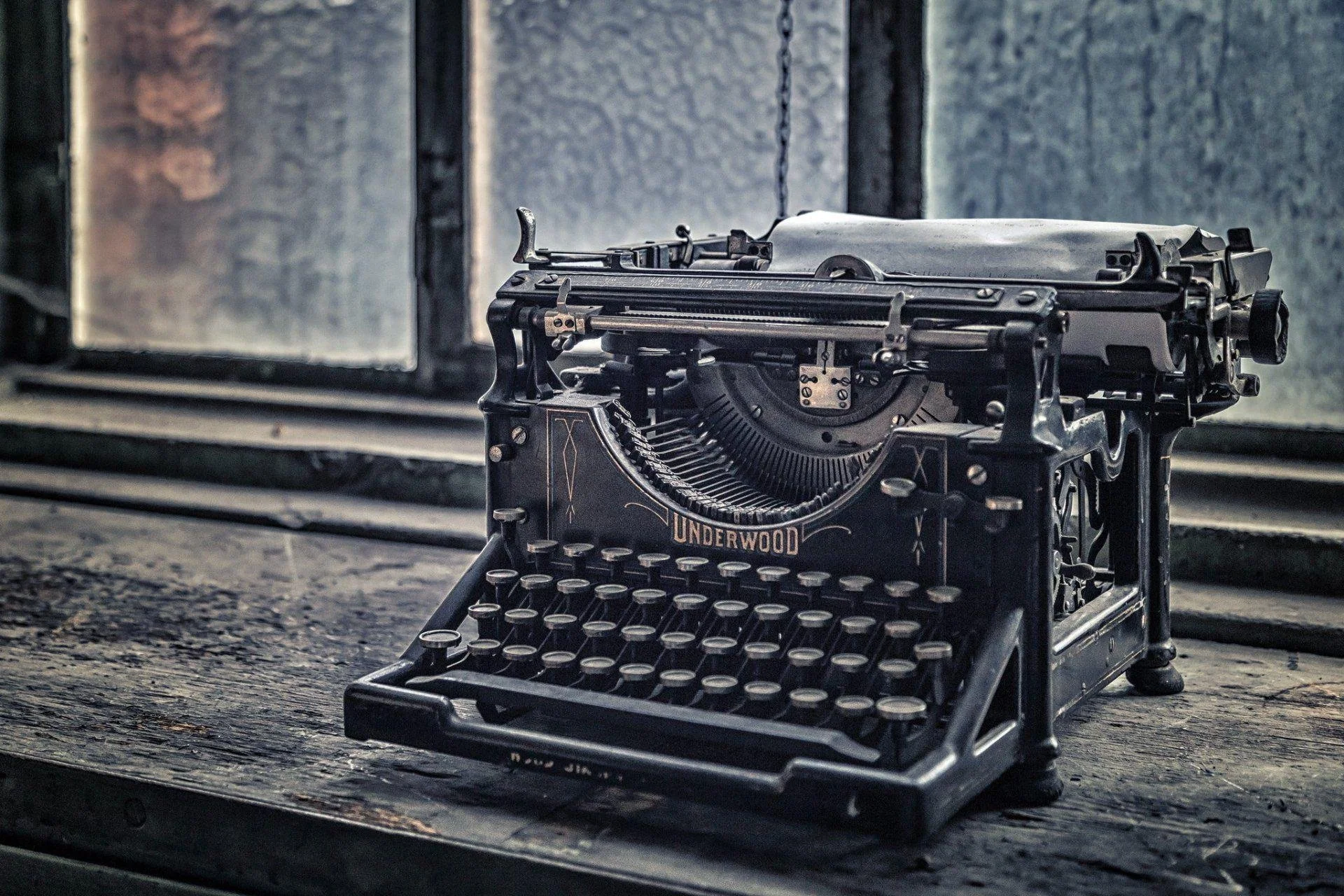 Vintage Underwood typewriter on a wooden desk