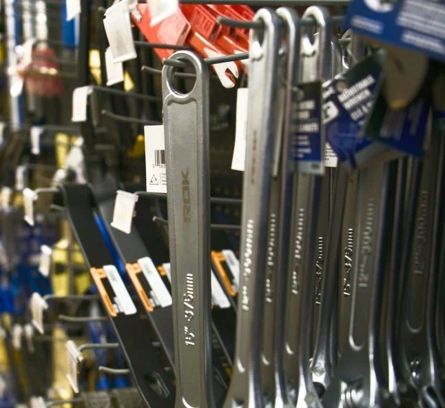 Set of hook tools hanging on a display rack at a hardware store