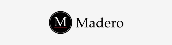 Madero logo featuring a black circle with a white letter M and the word Madero next to it.