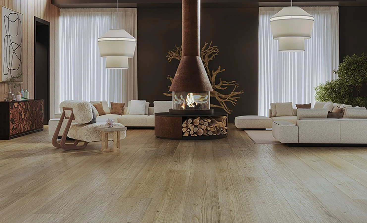 Modern living room with beige sectional sofas, a central fireplace with wood logs underneath, decorative hanging lights, and large windows with sheer curtains.