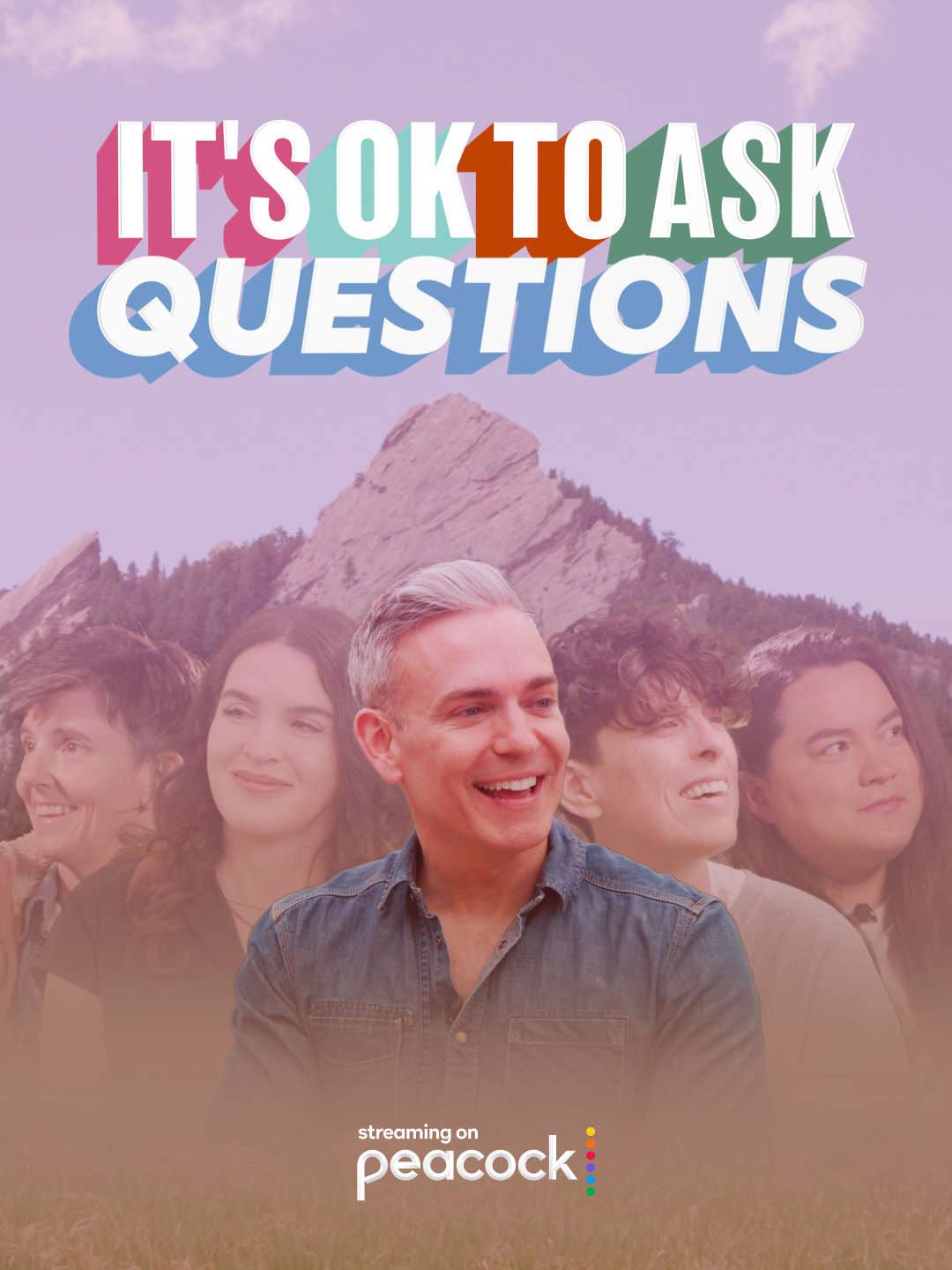 A promotional poster for a show called 'It's Ok to Ask Questions,' streaming on Peacock, featuring smiling people with a mountain backdrop and colorful text.