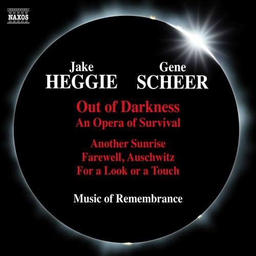 Black background with an eclipse image and white sunlight rays, featuring text about Jake Heggie and Gene Scheer, titled 'Out of Darkness: An Opera of Survival,' with a subtitle about Auschwitz, and mention of music of remembrance.