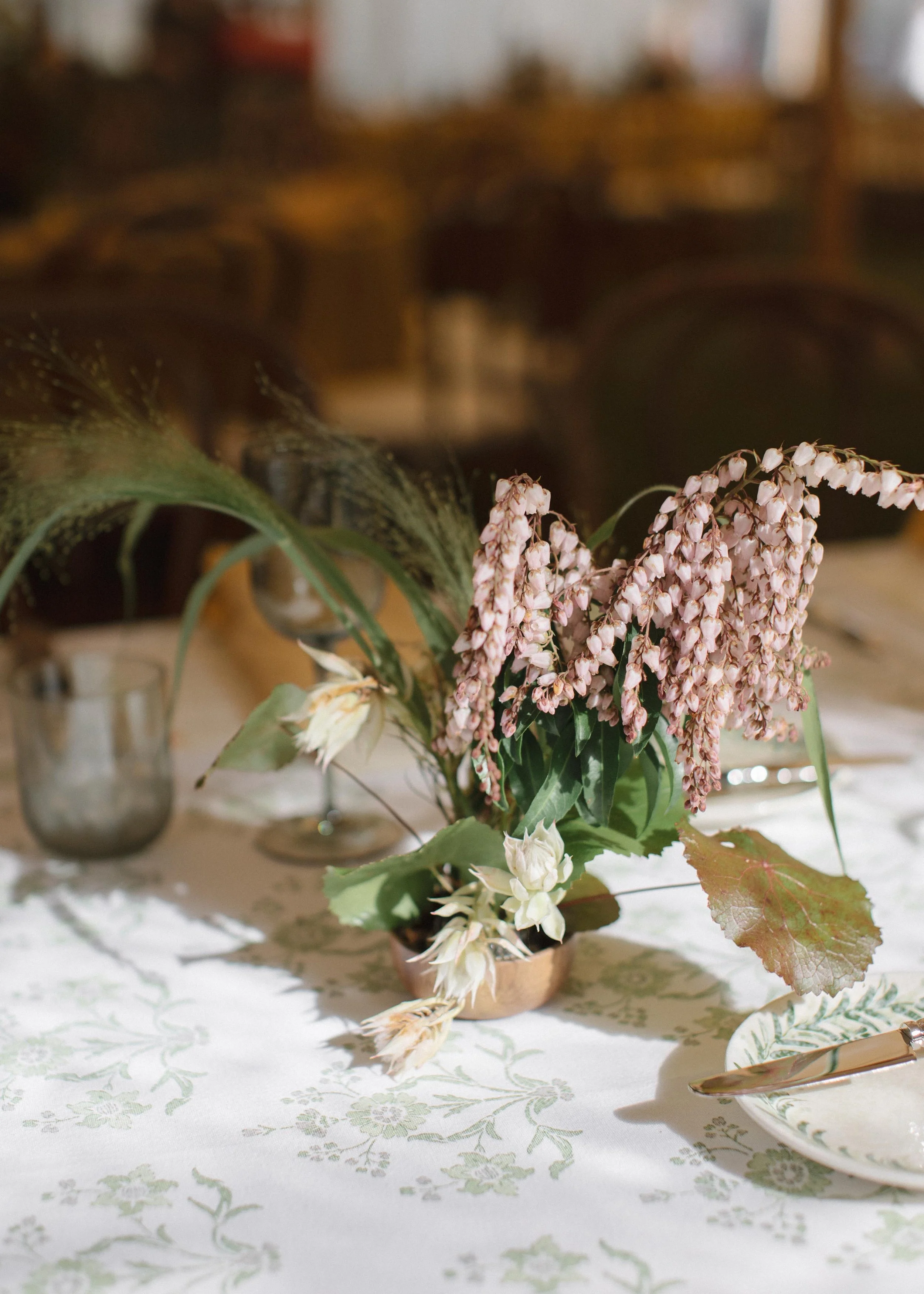 dainty white pink and green floral table bouquets