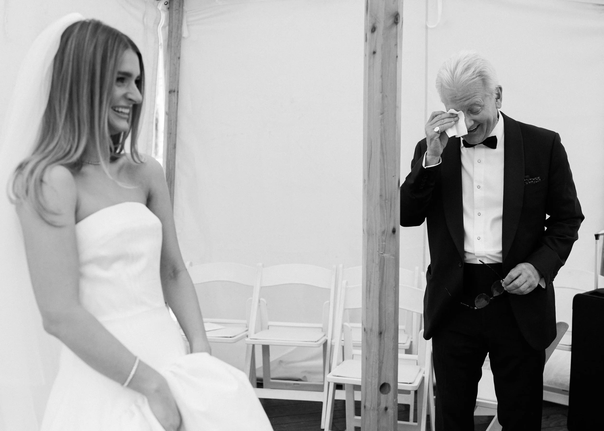 father of the bride crying at his daughter getting married