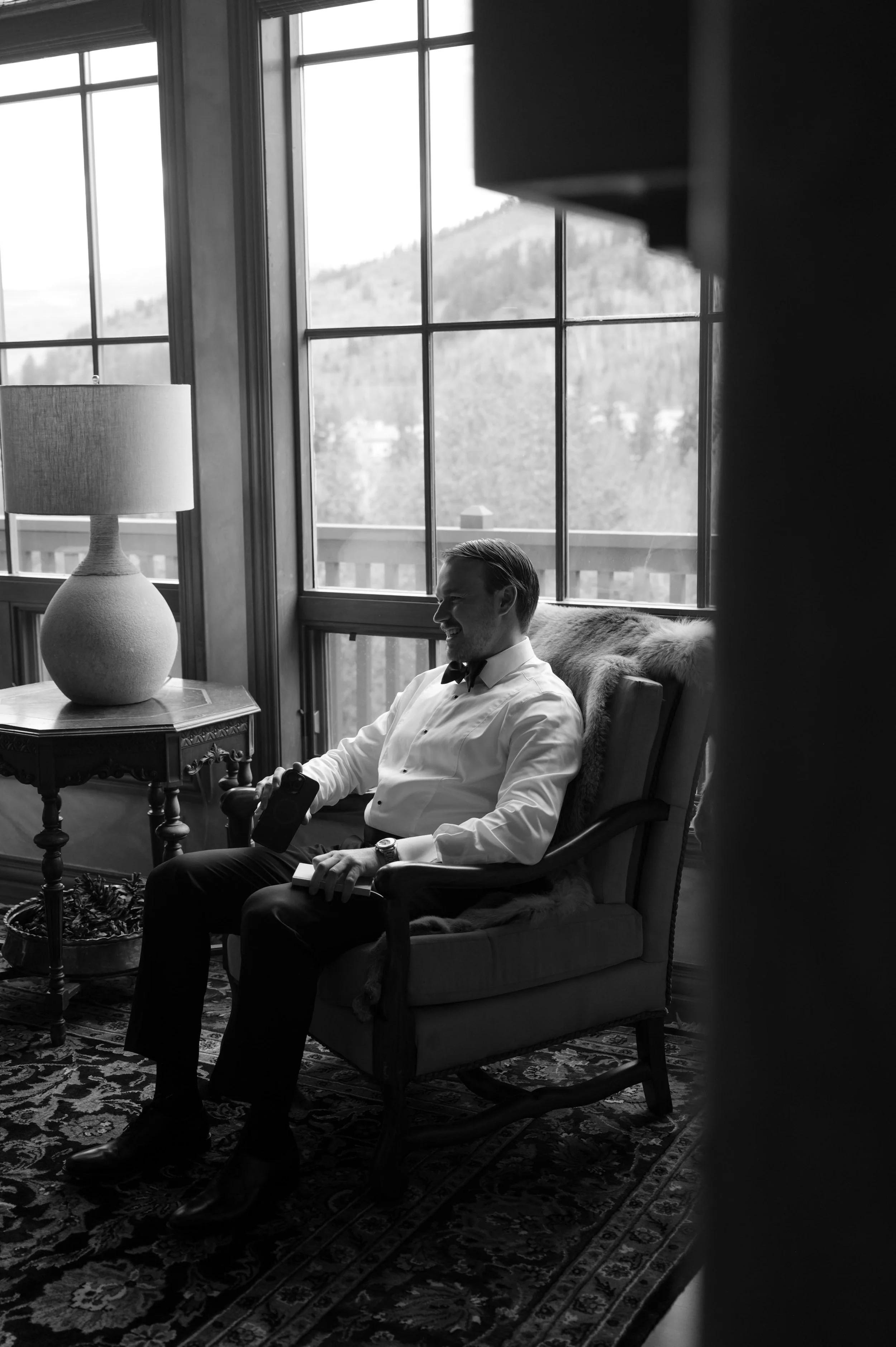 a groom waiting for his wedding ceremony with friends and family