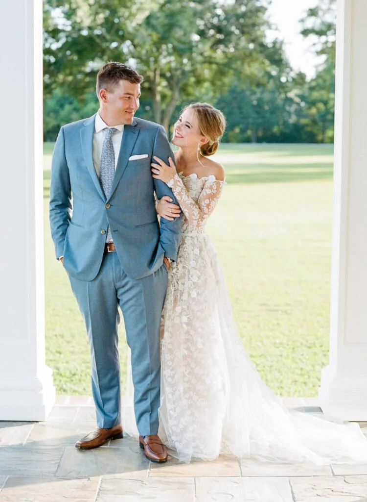 Bride and groom walking outdoors in Boston, elegant attire reflecting wedding trends 2026 style