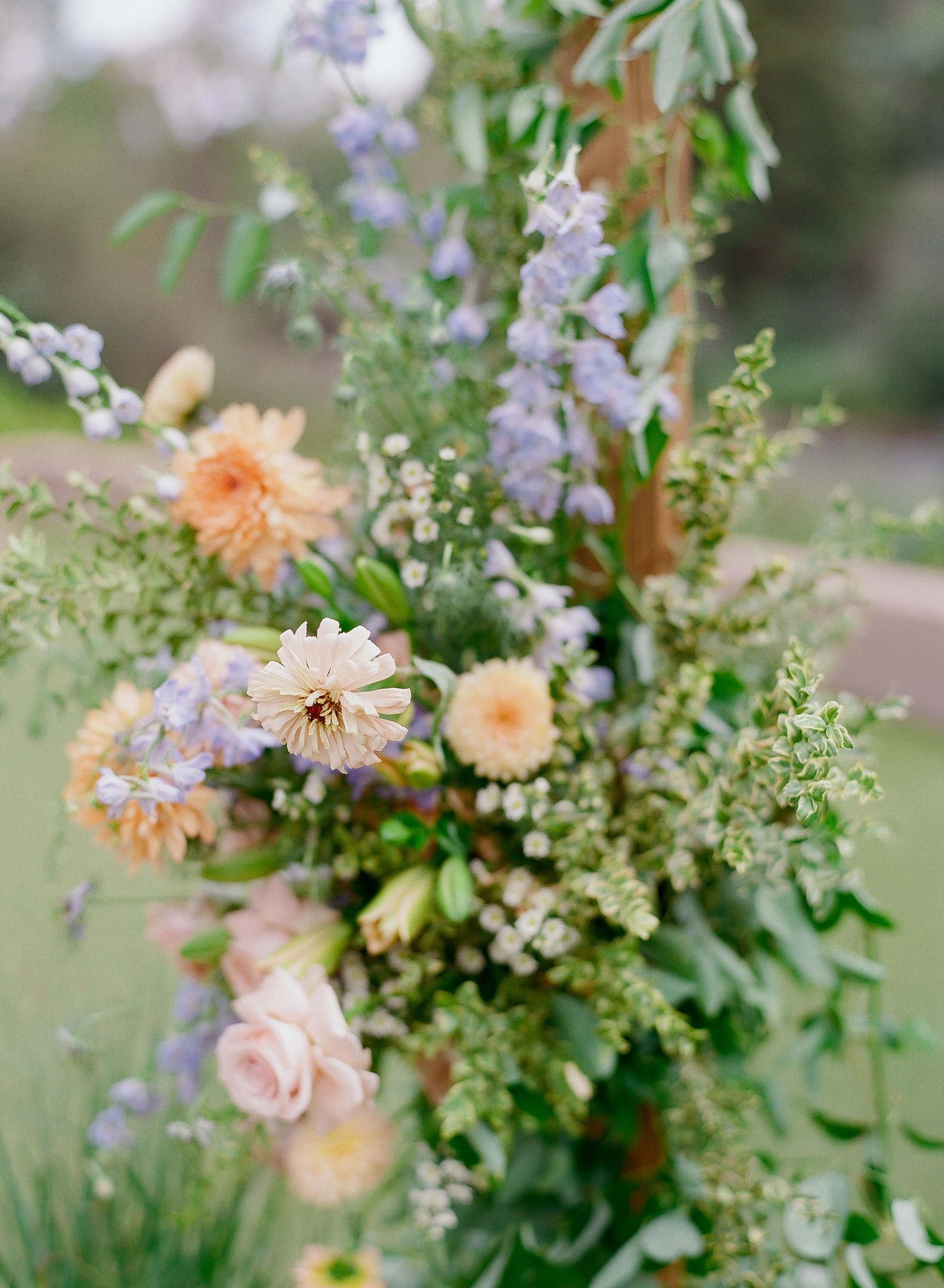 a gorgeous purple and orange flower bouquet