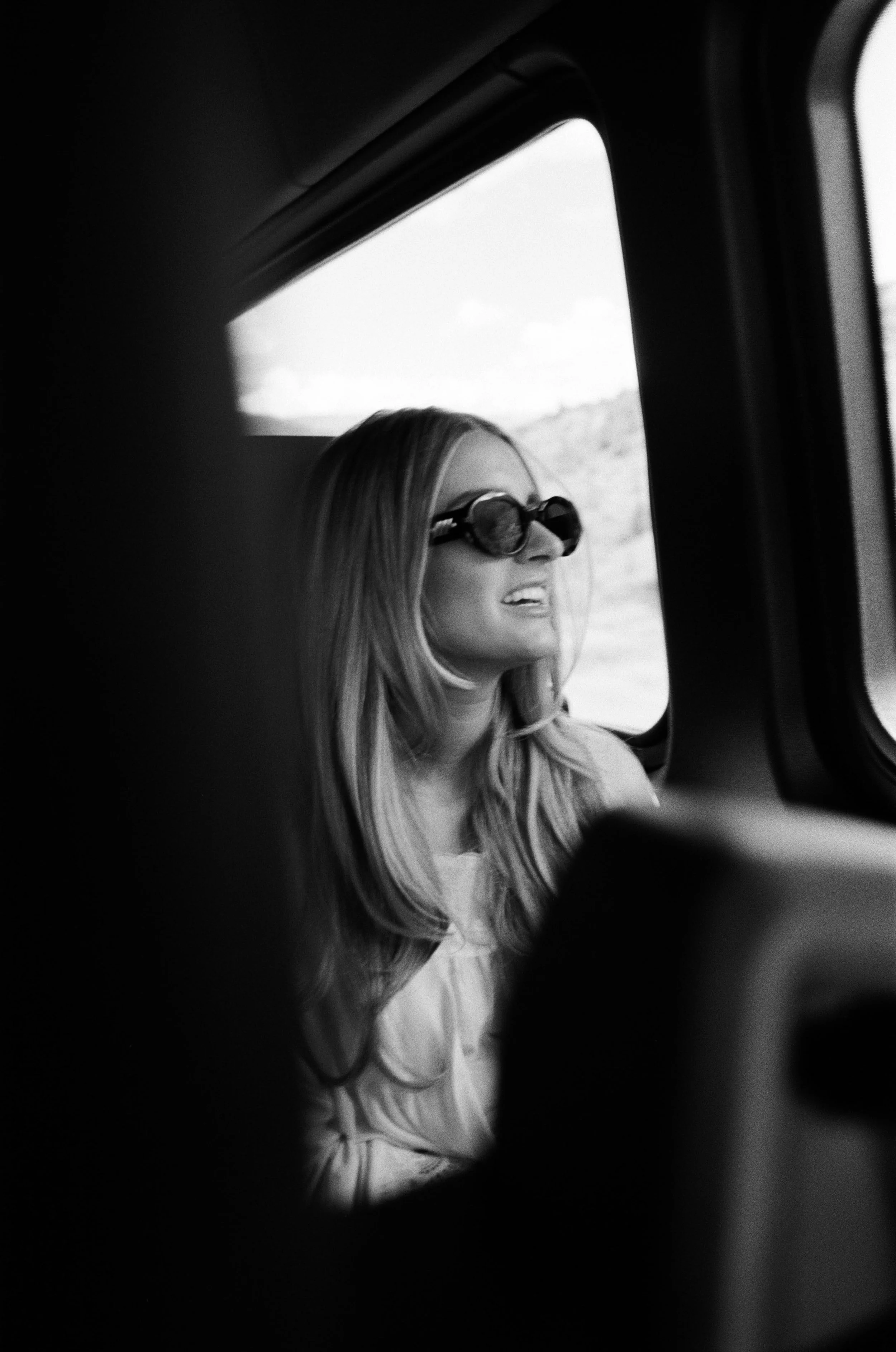 a chic bride on her way to her luxury wedding in colorado