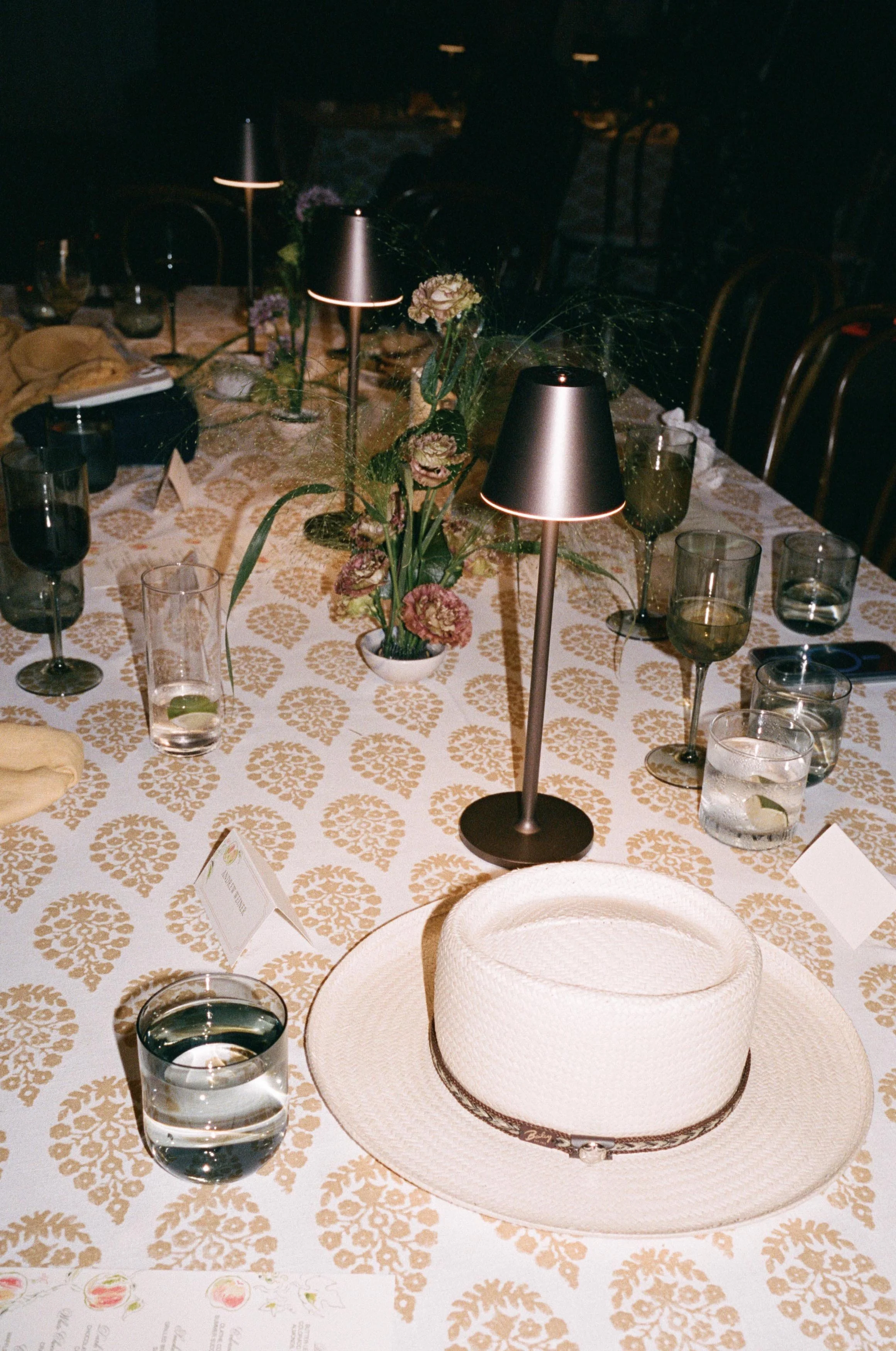 luxurious table decor including a cowboy hat at a wedding in colorado