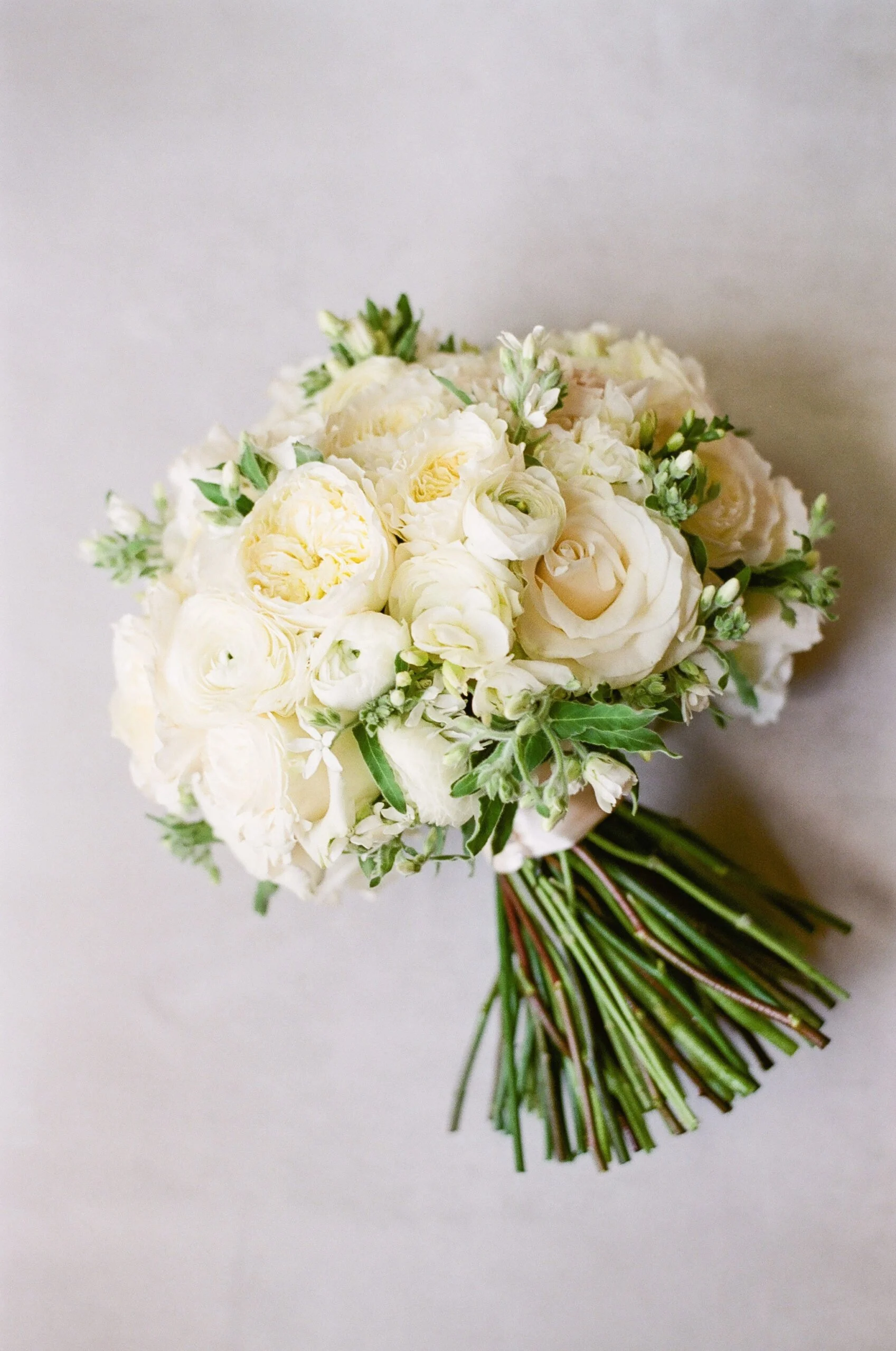 close up of a beautiful white bouquet while planning a destination wedding in New England