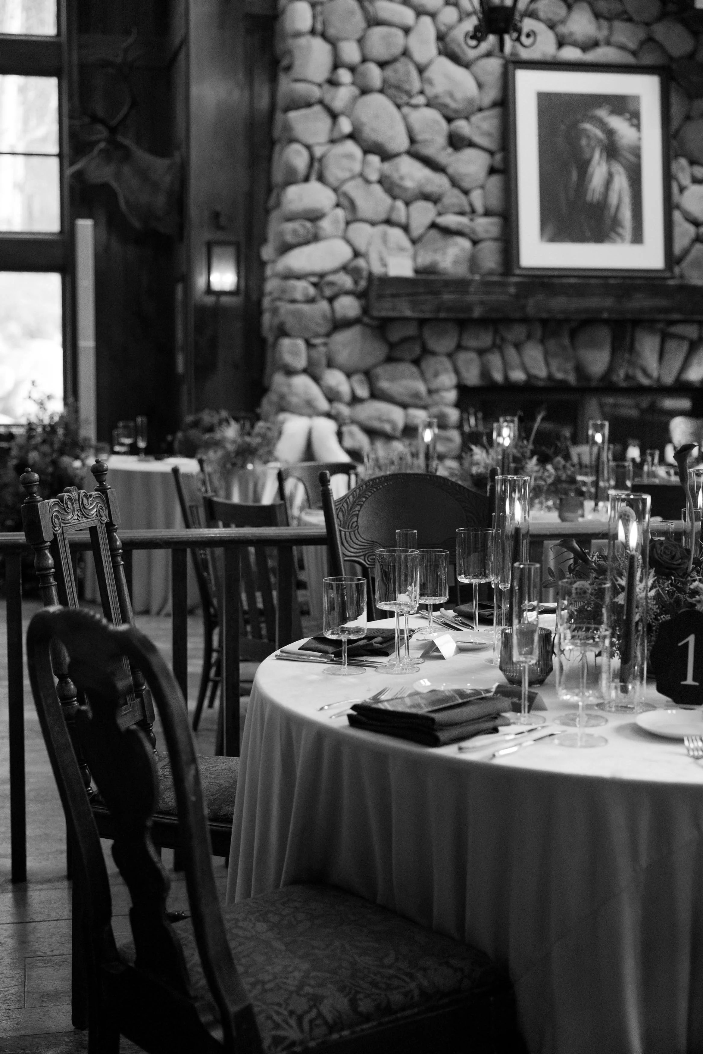 black and white photo of a luxurious wedding dinner party table for guests
