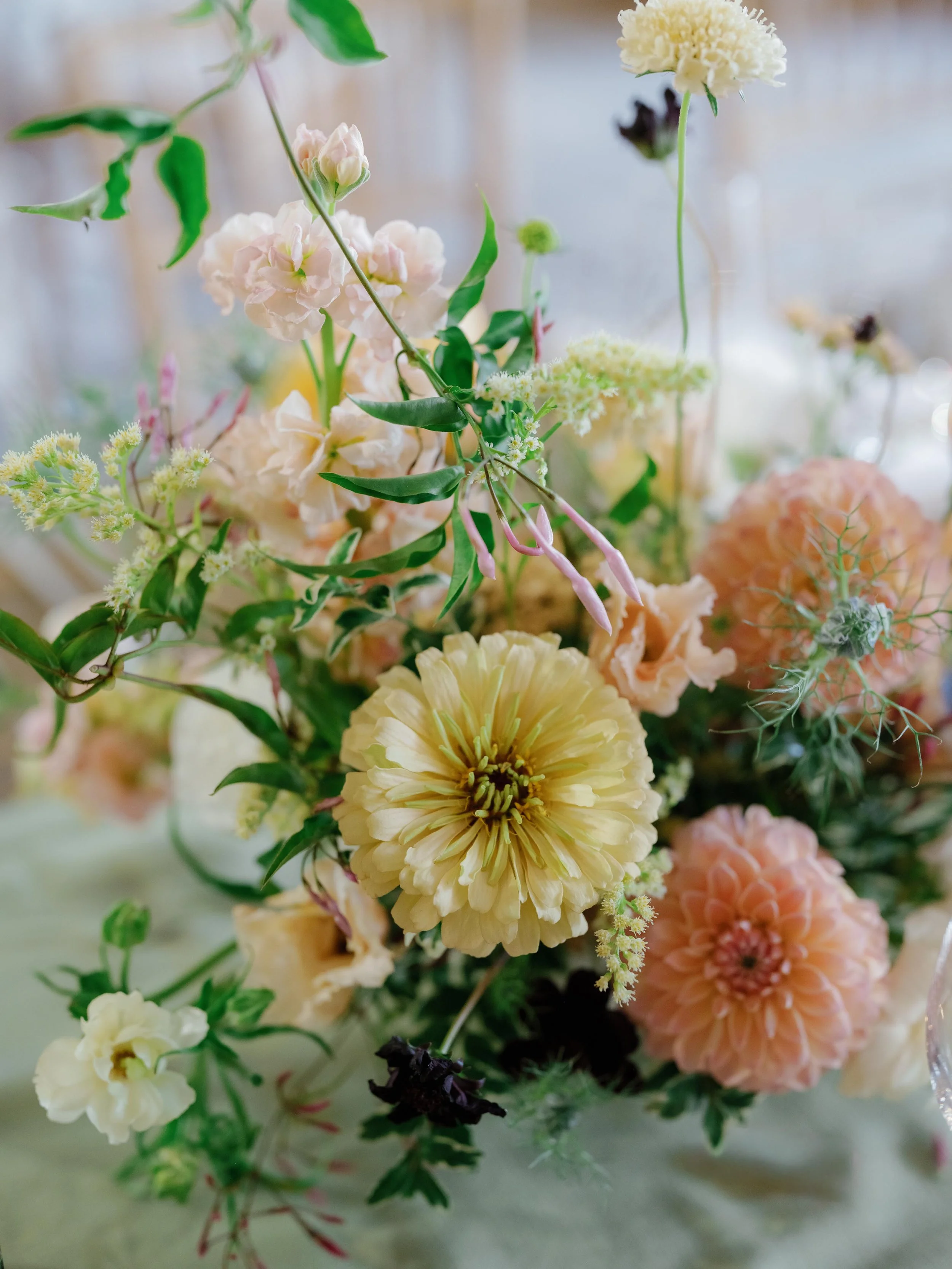 a closeup of a perfect custom floral arrangement for a wedding in beaver creek