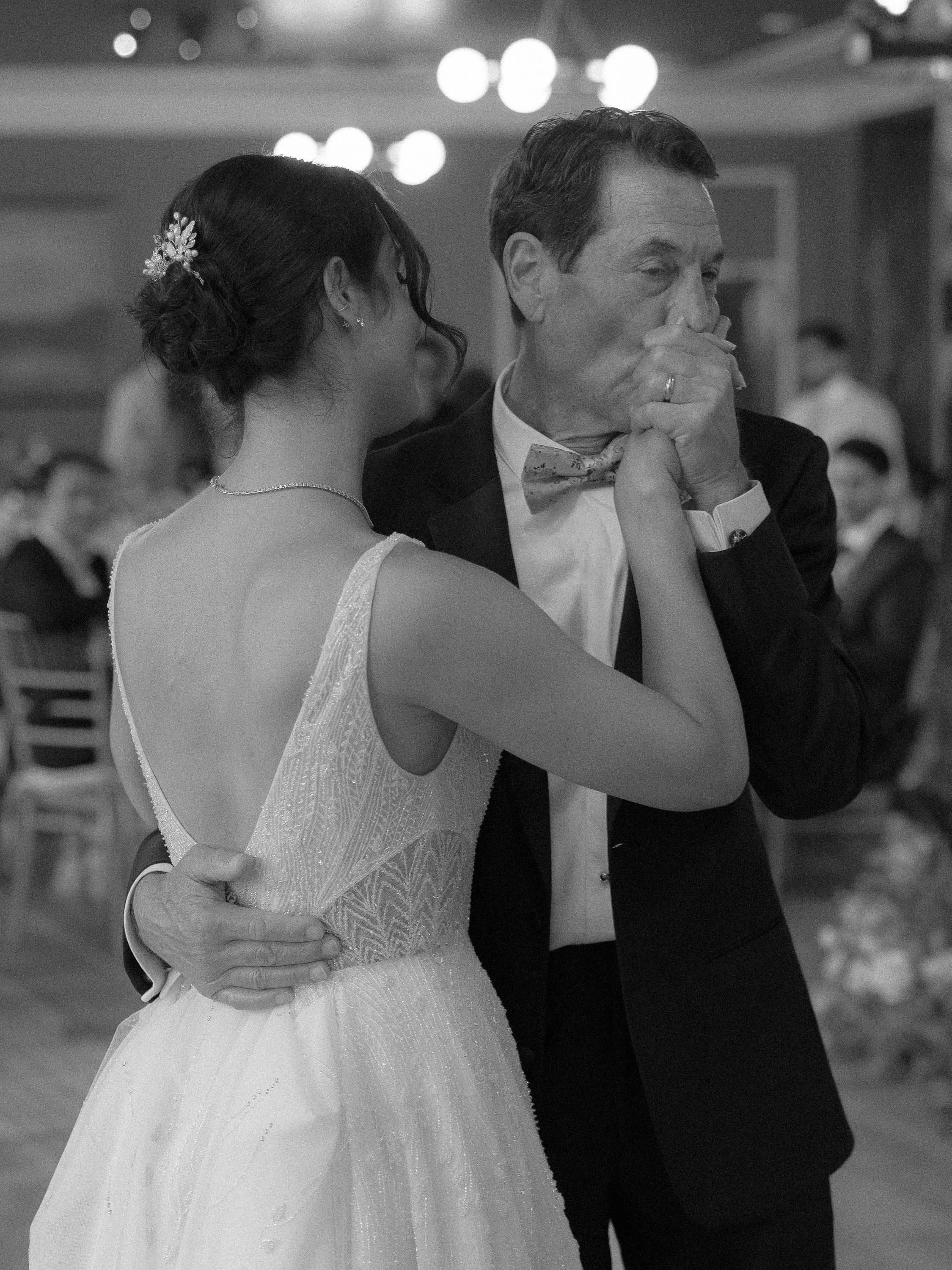 a bride dancing with her father at her wedding in colorado