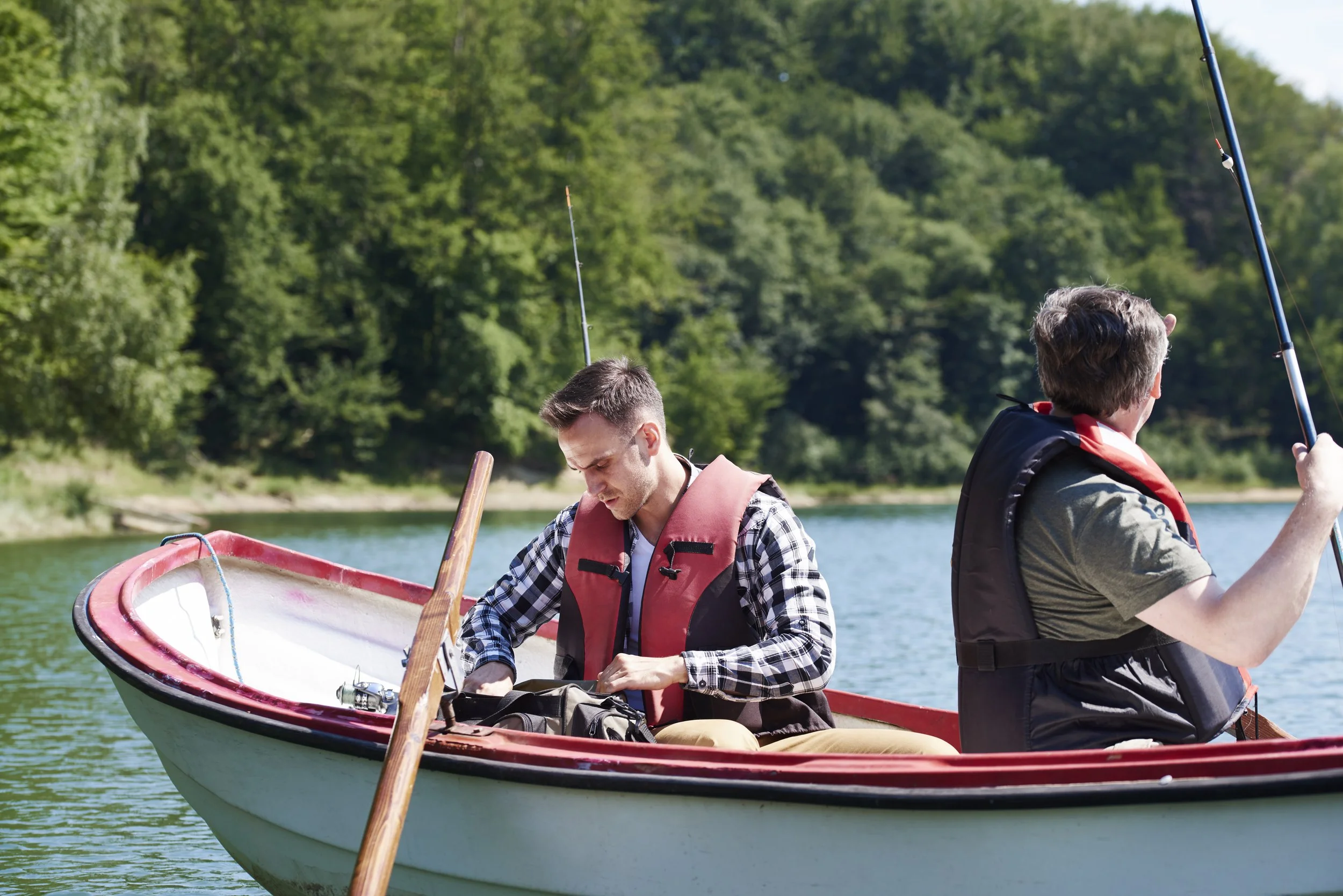 son-father-boat-make-preparations-fish.jpg