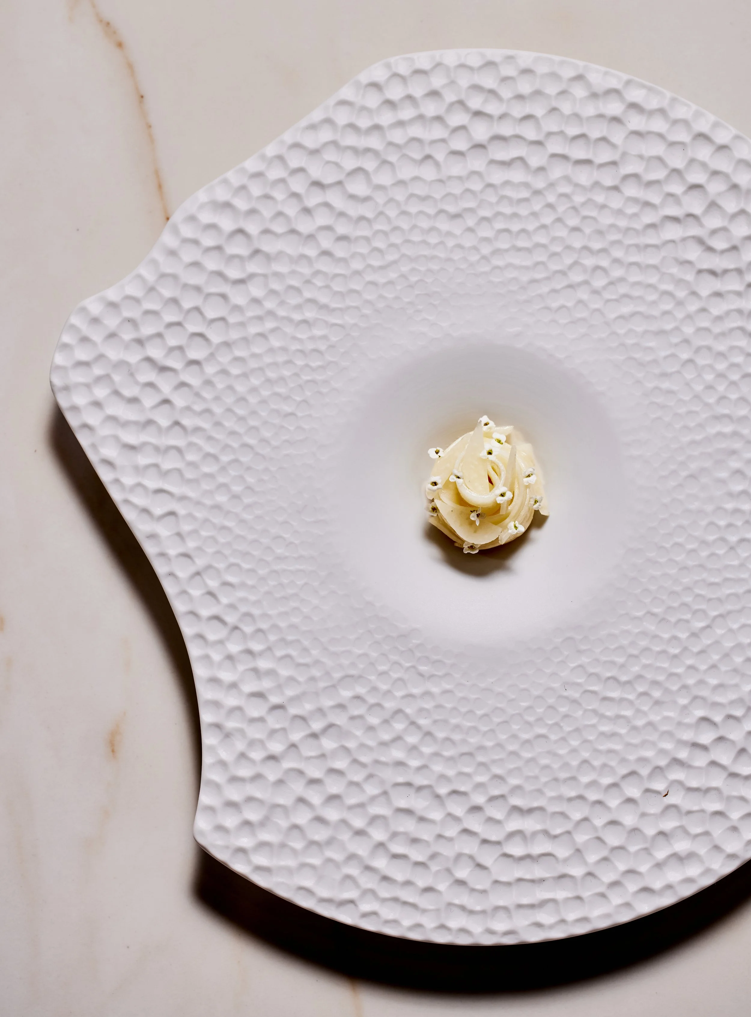 Gilfeather rutabaga with smoked and aged pork fat cream, a Harrison Cheney Signature