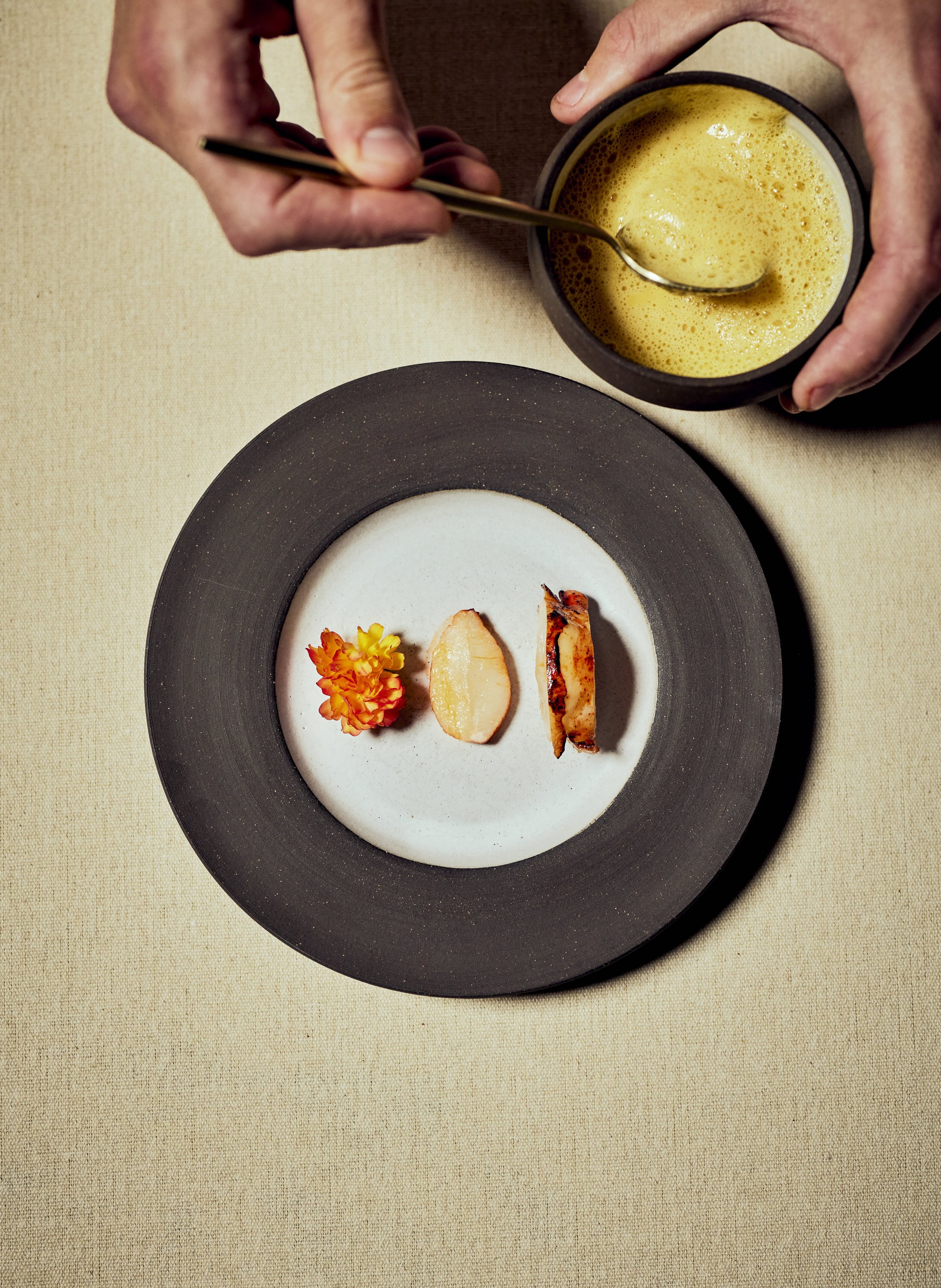 Lobster grilled whilst being brush with a syrup made from bird cherry, served with a sauce made from summer flowers.