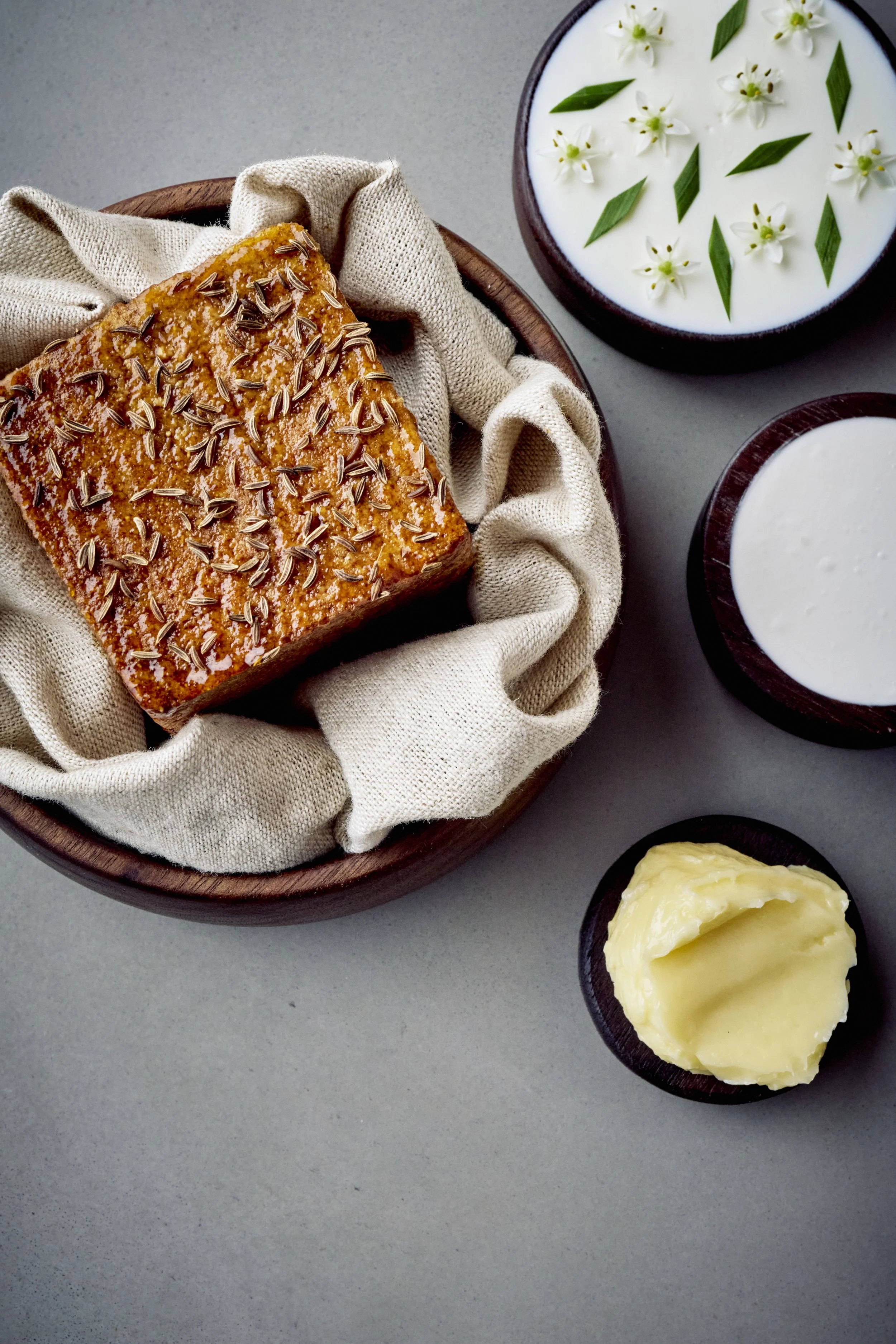 A bread made from house milled spelt with caraway and fresh cheese.