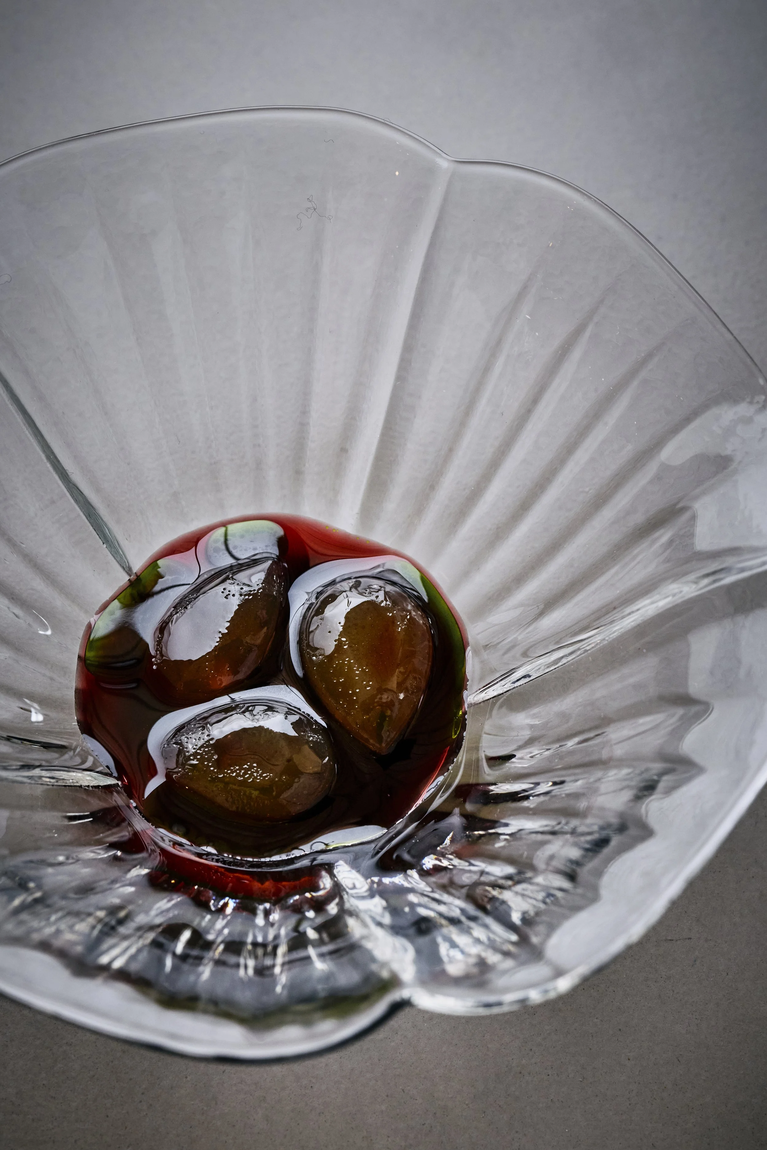 A jelly of crab apple with fermented cherry juice and fig leaf oil.