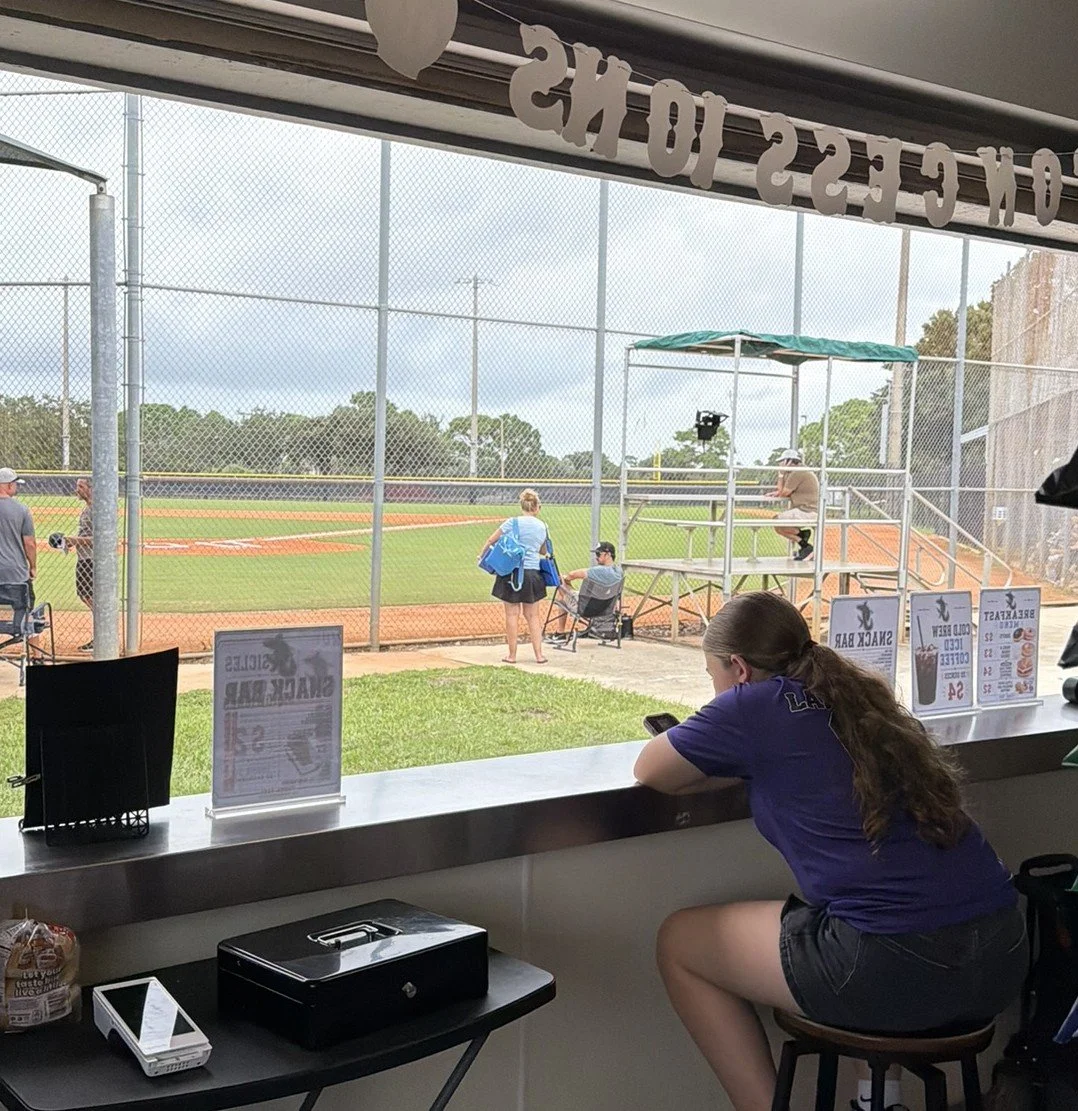 Sophia LaFleur working at the Jupiter Hammerheads concession stand during a weekend at Jupiter Community Park.