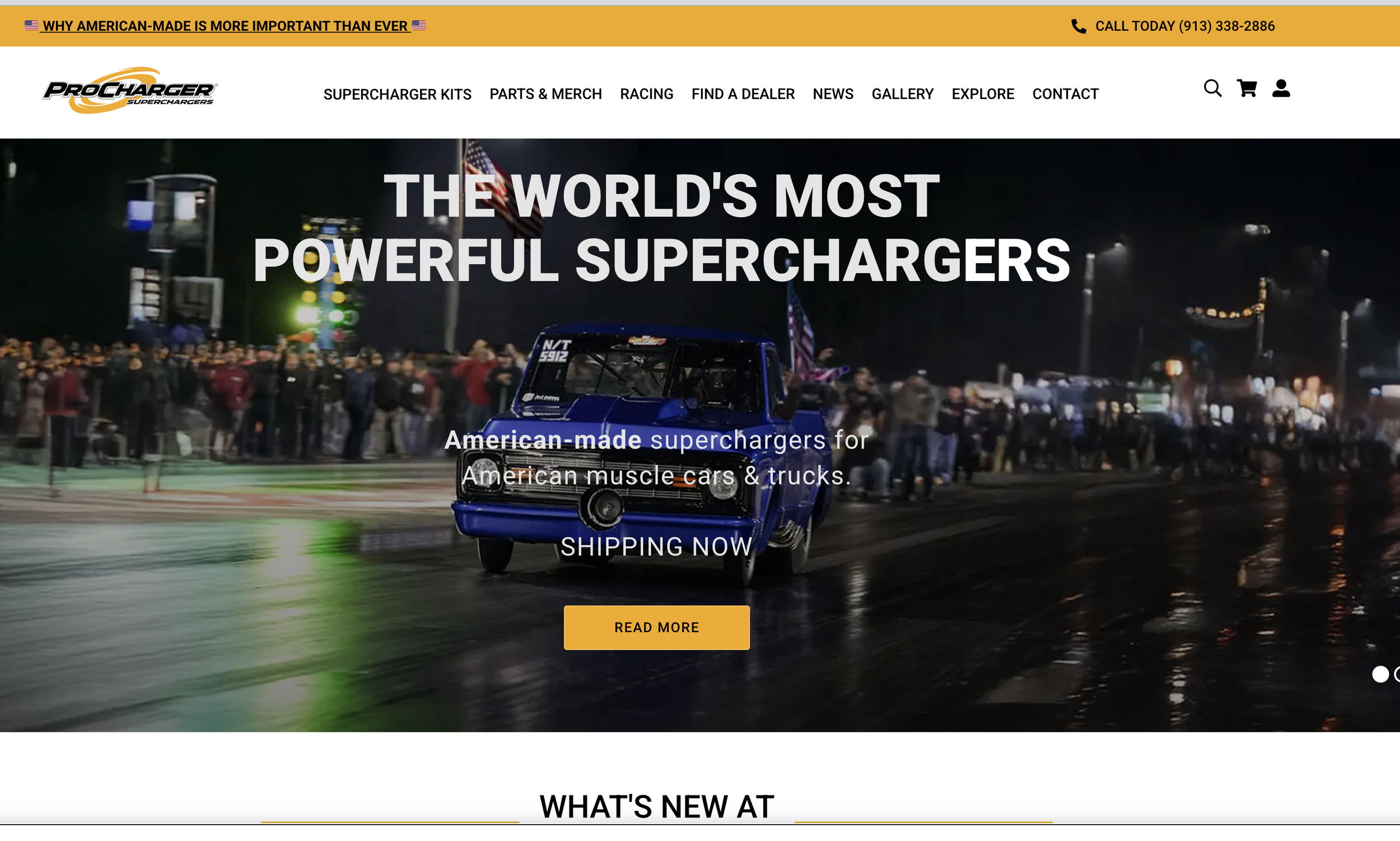 Nighttime scene at a race track with a race car performing a wheelie, surrounded by spectators, bright lights, and an American flag, on a website advertising supercharged muscle cars and trucks.