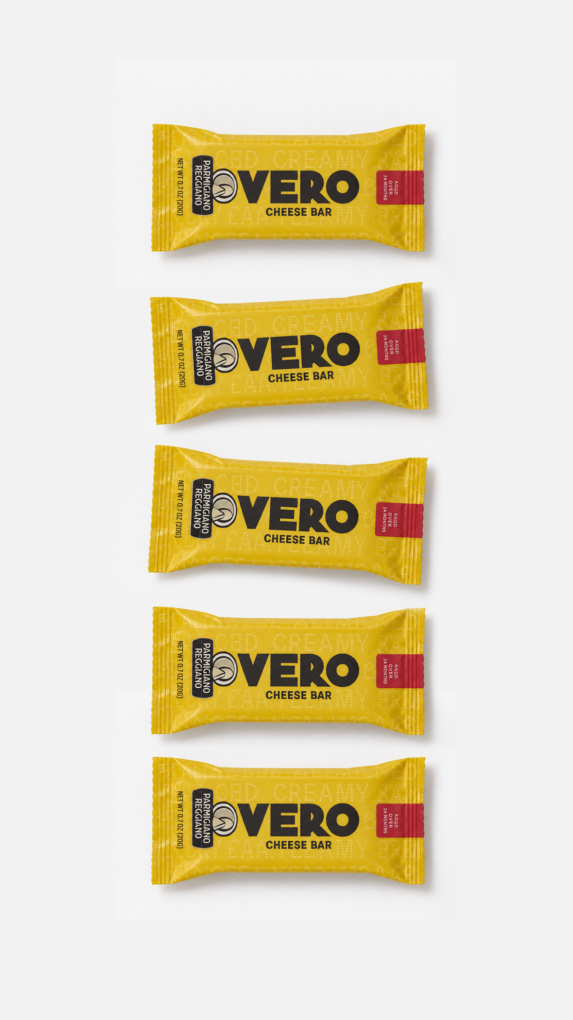 Four Vero brand cheese bars in yellow packaging arranged vertically on a white background.