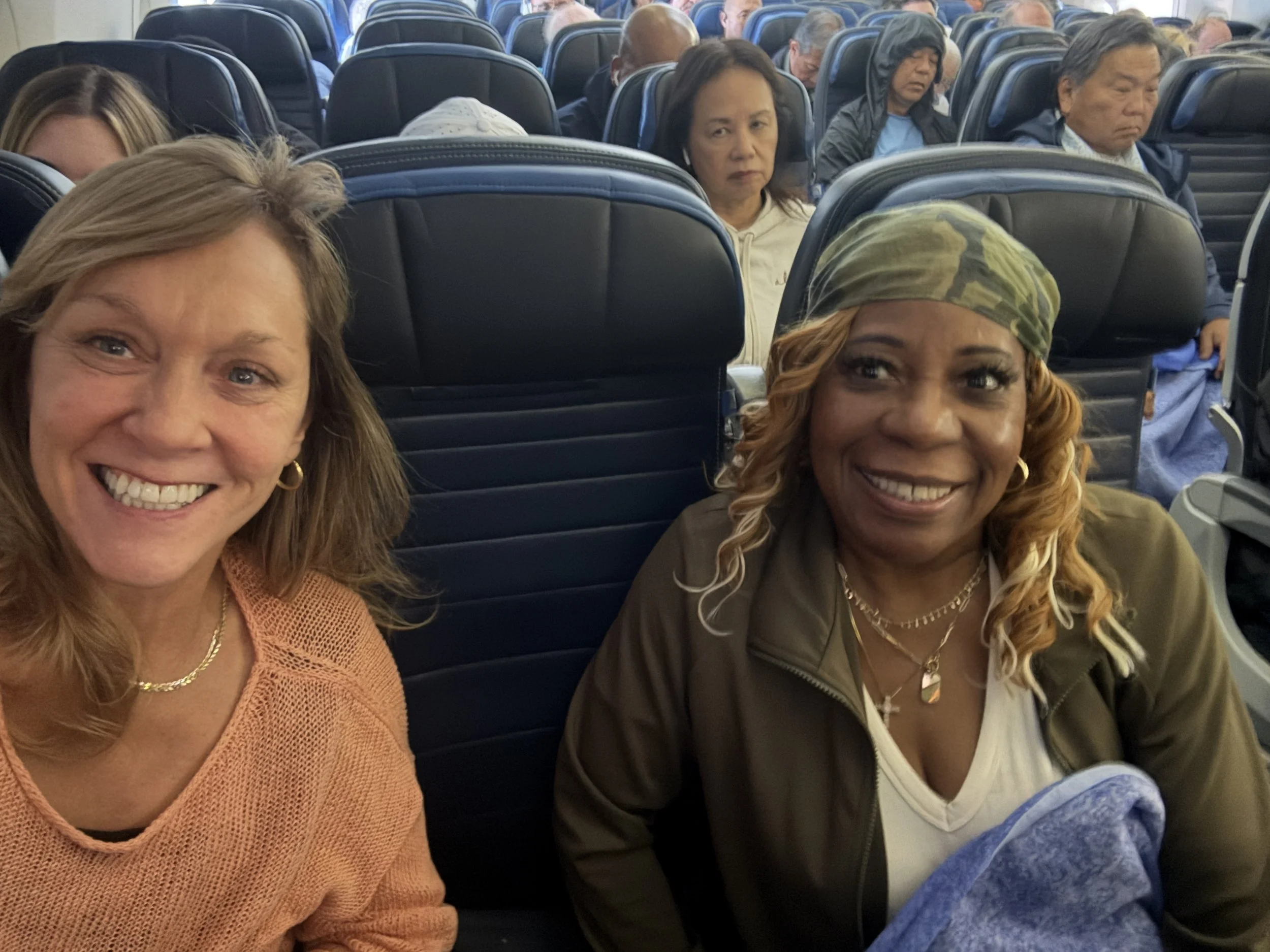 8 Hours seems like a long time, but when you fly United, have a sweet seat between you and your fellow passenger and catch up on living our best lives on our way to Hawaii - it was a pleasure! (I recommend the beef - my new friend Donnis did not like