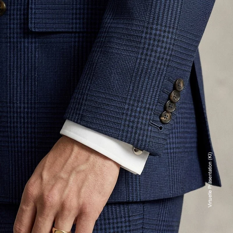 Aufknöpfbare Ärmelschlitze (Working Cuffs) mit Kissing Buttons an einem Maßanzug-Ärmel.