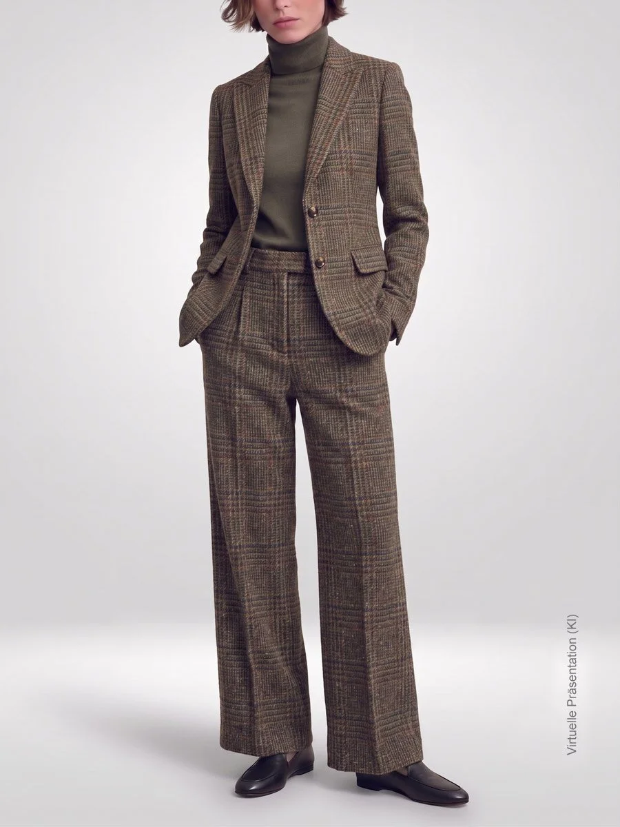 Authentischer Damen Tweedanzug nach Maß aus robustem schottischen Highland Tweed in moderner schmaler Silhouette von Atelier Burcu in Essen-Werden.